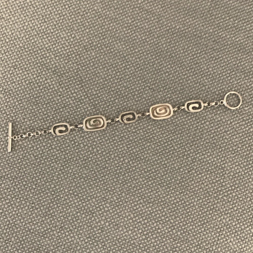 Costume bracelet… with mother of pearl in lay. Good condition.